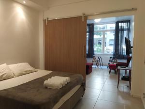 Кровать или кровати в номере Apartamento Copacabana: aconchego, conforto, privacidade