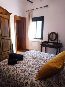 Postel nebo postele na pokoji v ubytování Cortijo El Pilón
