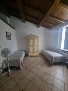 Voodi või voodid majutusasutuse Hotel Paese Corvara toas