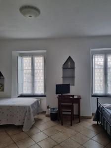 Voodi või voodid majutusasutuse Hotel Paese Corvara toas