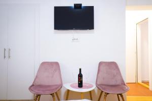 Un televizor și/sau centru de divertisment la Kuća JEKA
