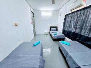 Postel nebo postele na pokoji v ubytování PANCHOR 6 HOSTEL