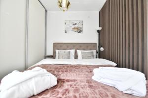 Postel nebo postele na pokoji v ubytování Apartman Vuk Divčibare