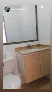 Ванная комната в Hermoso Departamento El Tabo