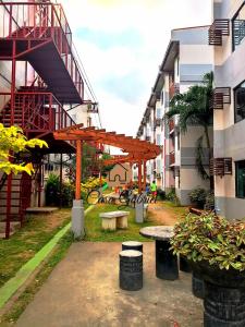 a park with a bench and a wooden structure at Casa Gabriel in Marilao in Marilao