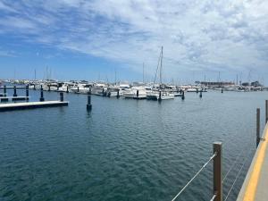 a marina filled with lots of boats on the water at Radhe room in Perth