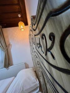 a close up of a bed in a bedroom at Albayrak Konağı Otel in Amasya