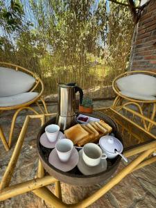 Příslušenství pro přípravu čaje a kávy v ubytování Glamping el nido