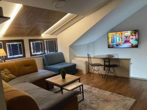 Μια τηλεόραση ή/και κέντρο ψυχαγωγίας στο Urban Corner - Deluxe Apartments