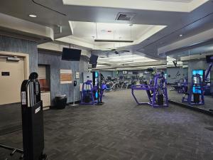 a gym with treadmills and elliptical machines at Perfect Spot Unit by Horseshoe Casino Strip Las Vegas in Las Vegas