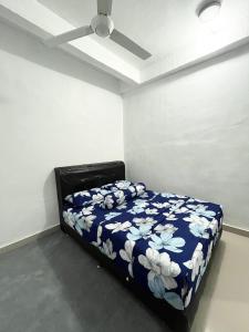 Cama o camas de una habitación en Baiduri Homestay