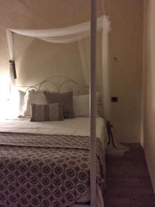 Postel nebo postele na pokoji v ubytování Ai due Mori Apt by Addler House Ospitality