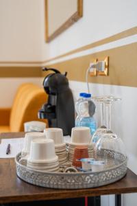 Príslušenstvo na prípravu kávy alebo čaju v ubytovaní Teresa Rooms & Suites