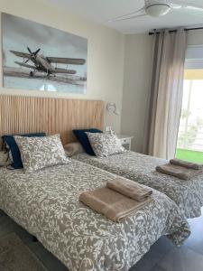 Postel nebo postele na pokoji v ubytování APARTAMENTO EN PRIMERA LINEA/BEACHFRONT APARTMENT