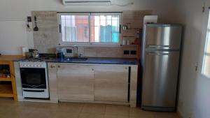 A kitchen or kitchenette at La quinta de Lucas