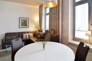 Ein Sitzbereich in der Unterkunft Villa Schering App. EG links