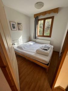 Posteľ alebo postele v izbe v ubytovaní Appartement Orelle 3 Vallées - Spa & Piscine - Apt 112 + 25 fotografií