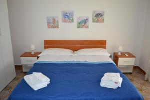 Llit o llits en una habitació de Villa Melina
