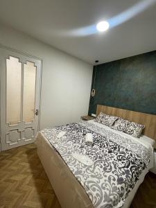 Postel nebo postele na pokoji v ubytování Modern studio in the city center