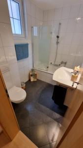 Koupelna v ubytování Apartment ZerMo + 16 fotografií