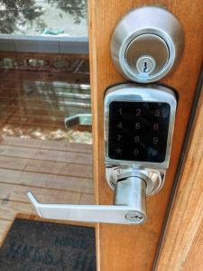 a door with a door knob and a lock on it at Modern Treehouse, close to downtown and beach in Wilmington