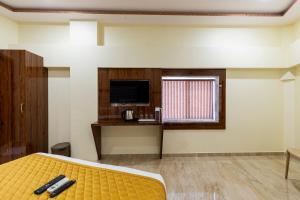 TV a/nebo společenská místnost v ubytování Hotel New Imperial