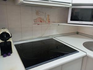 Kuchyň nebo kuchyňský kout v ubytování Apartamento Laguna Beach Torrox Costa