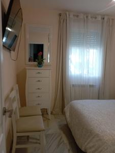 TV a/nebo společenská místnost v ubytování Apartamento Laguna Beach Torrox Costa