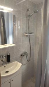 Koupelna v ubytování Apartment Uki