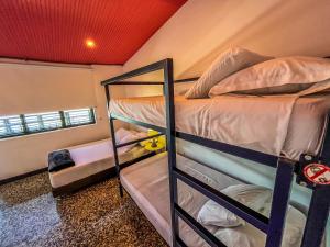 Postel nebo postele na pokoji v ubytování Fardo Hotel Boutique en Ibague - Zona G - Recepción Digital 24H