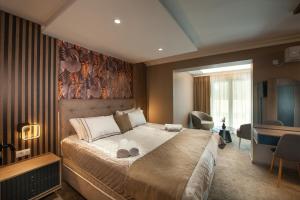 Postel nebo postele na pokoji v ubytování Hotel Kralj + 37 fotografií