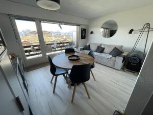 Posezení v ubytování Vincenzo appart, Studio Confortable à Nendaz, accès Direct au Télécabine de Tracouet et Parking Souterrain Inclus