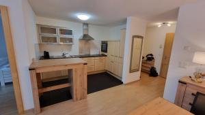 Kuchyň nebo kuchyňský kout v ubytování Apartment ZerMo