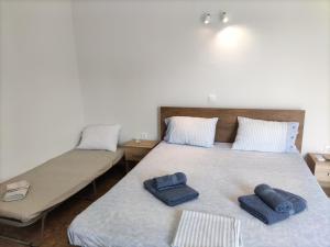 Krevet ili kreveti u jedinici u objektu Sunlit Shores Apartment