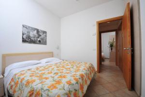 Кровать или кровати в номере Hotel Aurora