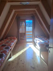 Ένα ή περισσότερα κρεβάτια σε δωμάτιο στο Gorska vila