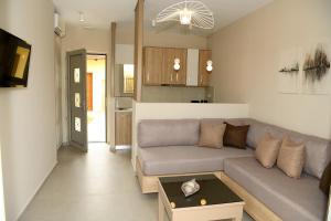 Area tempat duduk di Abelia Abode Apt