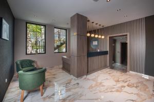 Uma televisão e/ou sistema de entretenimento em Hotel Kralj