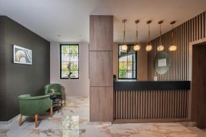 Uma área de estar em Hotel Kralj