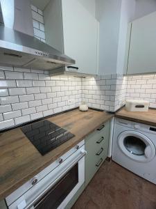 Kuchyň nebo kuchyňský kout v ubytování Precioso apartamento en Roquetas de Mar
