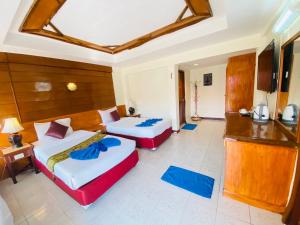Postel nebo postele na pokoji v ubytování Koh Chang Resort