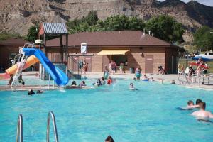 a group of people in a swimming pool at Helper Sunrise Peak in Helper