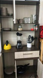 a kitchen with a counter with a blender on it at Apartment in Colonia Molina in Quetzaltenango