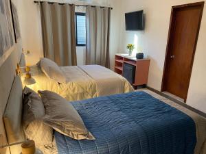 Postel nebo postele na pokoji v ubytování Casa Dei Girasoli