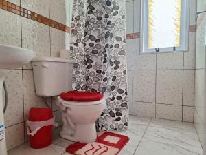 Koupelna v ubytování Alojamiento Las Palmeras