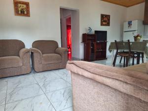 Posezení v ubytování Alojamiento Las Palmeras