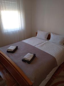 Katil atau katil-katil dalam bilik di Apartman TRIBUN