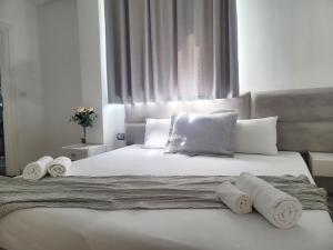 Ліжко або ліжка в номері Hotel Myrtaj