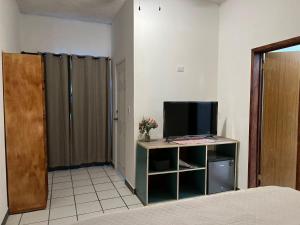 TV a/nebo společenská místnost v ubytování Casa Dei Girasoli