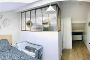 Postel nebo postele na pokoji v ubytování Maison lumineuse de 100m2 avec jardin et parking.